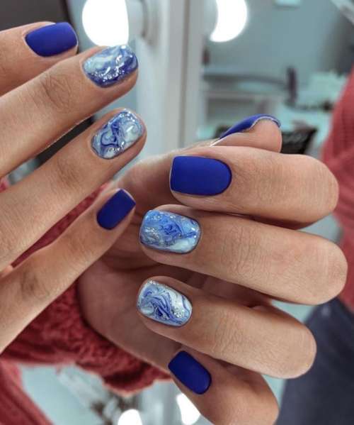 Blue glitter manicure