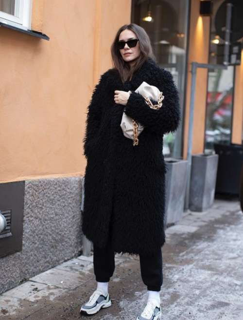 Fashionable black fur coat